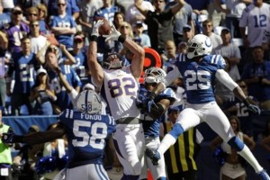 Minnesota Vikings' Kyle Rudolph (82) misses a catch during the second half of an NFL football game against the Indianapolis Colts in Indianapolis, Sunday, Sept. 16, 2012. Vikings' Stephen Burton caught the football for a 7-yard touchdown reception. (AP Photo/Michael Conroy)